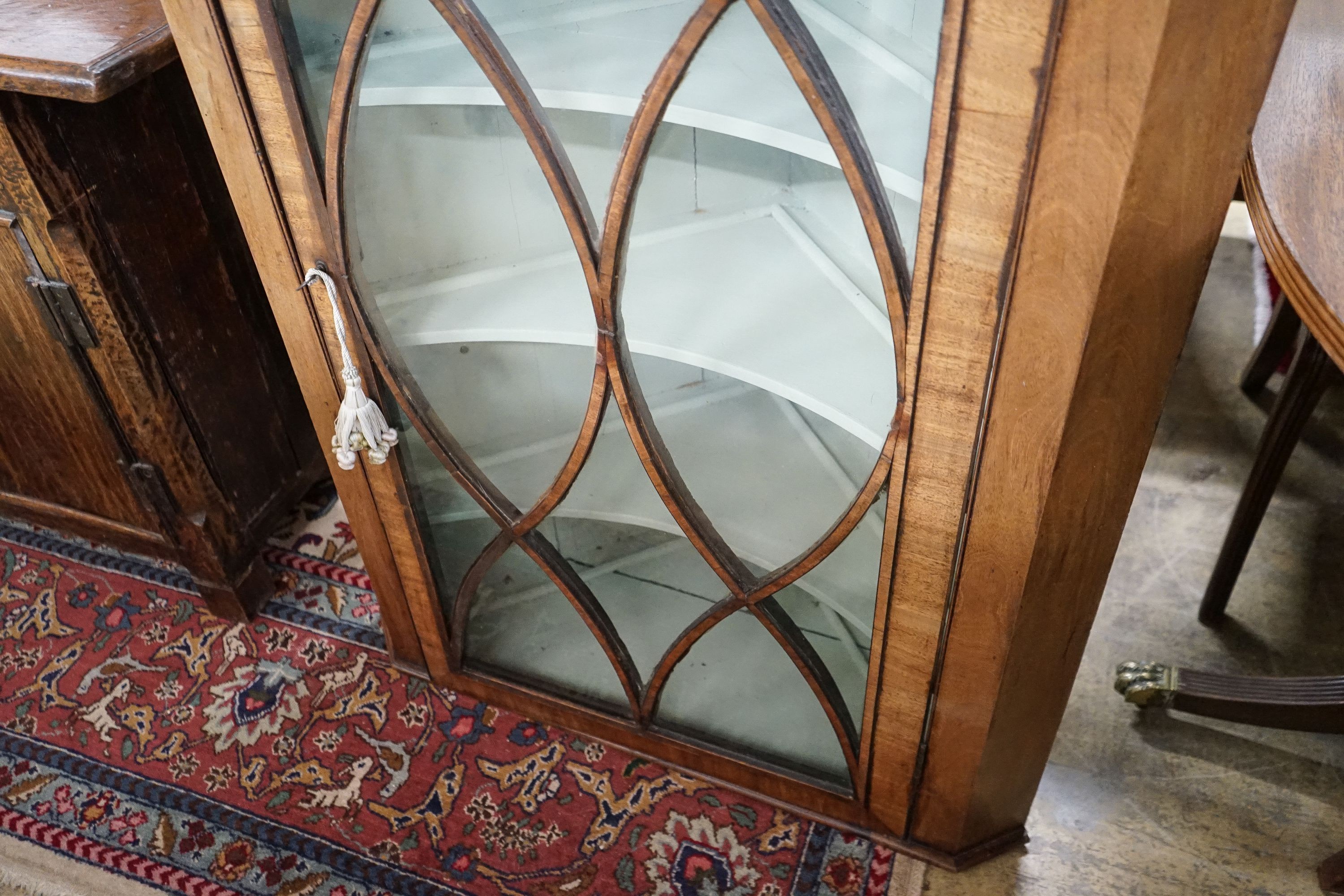 A George III mahogany hanging corner cabinet, width 82cm, depth 46cm, height 127cm